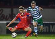 10 March 2023; Matty Smith of Shelbourne in action against Sean Hoare of Shamrock Rovers during the SSE Airtricity Men's Premier Division match between Shelbourne and Shamrock Rovers at Tolka Park in Dublin. Photo by Seb Daly/Sportsfile