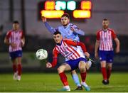 10 March 2023; Enda Curran of Treaty United in action against Dale Holland of Cobh Ramblers during the SSE Airtricity Men's First Division match between Treaty United and Cobh Ramblers at Markets Field in Limerick. Photo by Michael P Ryan/Sportsfile