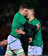 10 March 2023; Diarmuid Mangan of Ireland, left, celebrates with teammate Sam Prendergast after scoring their side's eighth try during the U20 Six Nations Rugby Championship match between Scotland and Ireland at Scotstoun Stadium in Glasgow, Scotland. Photo by Brendan Moran/Sportsfile