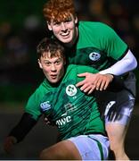 10 March 2023; Oscar Cawley of Ireland celebrates with teammate Rory Telfer, right, after scoring their side's 12th try during the U20 Six Nations Rugby Championship match between Scotland and Ireland at Scotstoun Stadium in Glasgow, Scotland. Photo by Brendan Moran/Sportsfile