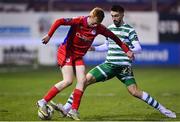 10 March 2023; Shane Farrell of Shelbourne in action against Neil Farrugia of Shamrock Rovers during the SSE Airtricity Men's Premier Division match between Shelbourne and Shamrock Rovers at Tolka Park in Dublin. Photo by Seb Daly/Sportsfile