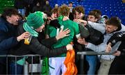 10 March 2023; Hugh Gavin of Ireland celebrates with supporters after the U20 Six Nations Rugby Championship match between Scotland and Ireland at Scotstoun Stadium in Glasgow, Scotland. Photo by Brendan Moran/Sportsfile