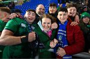 10 March 2023; Ruadhán Quinn of Ireland celebrates with his family, father Eugene, mother Valerie, Cormac, Muiris and Dannan, after the after the U20 Six Nations Rugby Championship match between Scotland and Ireland at Scotstoun Stadium in Glasgow, Scotland. Photo by Brendan Moran/Sportsfile