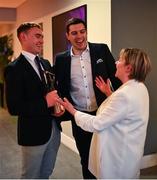 10 March 2023; Kilmacud Crokes chairperson Joan Keogh with Ballygunner hurler Pauric Mahony, left, and Kerins O’Rahilly’s footballer David Moran at the AIB Club Players Awards at Croke Park in Dublin. Photo by David Fitzgerald/Sportsfile