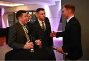 10 March 2023; Dunloy Cúchullain's players Kevin Molloy, left, and Ryan McGarry with Ballygunner hurler Pauric Mahony at the AIB Club Players Awards at Croke Park in Dublin. Photo by David Fitzgerald/Sportsfile