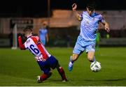 10 March 2023; William Armshaw of Treaty United in action against Luke Desmond of Cobh Ramblers during the SSE Airtricity Men's First Division match between Treaty United and Cobh Ramblers at Markets Field in Limerick. Photo by Michael P Ryan/Sportsfile