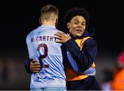 10 March 2023; Cobh Ramblers players, from left, Michael McCarthy, and Issa Kargbo after their side's victory in the SSE Airtricity Men's First Division match between Treaty United and Cobh Ramblers at Markets Field in Limerick. Photo by Michael P Ryan/Sportsfile
