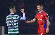 10 March 2023; Kameron Ledwidge of Shelbourne and Jack Byrne of Shamrock Rovers shake hands after the SSE Airtricity Men's Premier Division match between Shelbourne and Shamrock Rovers at Tolka Park in Dublin. Photo by Seb Daly/Sportsfile