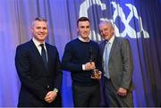 10 March 2023; Shane Cunningham of Kilmacud Crokes is presented with his AIB GAA Football Club Player of The Year award by GAA Vice President John Murphy, right, and AIB CMO Mark Doyle, at the AIB Club Players Awards at Croke Park in Dublin. Photo by Ramsey Cardy/Sportsfile
