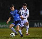 10 March 2023; Dara Keane of UCD in action against Darragh Markey of Drogheda United during the SSE Airtricity Men's Premier Division match between UCD and Drogheda United at UCD Bowl in Dublin. Photo by Stephen Marken/Sportsfile