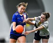 11 March 2023; Leah Boyle of MTU Kerry in action against Amy Garland of University of Ulster during the 2023 Yoplait Ladies HEC Giles Cup Final match between University of Ulster and MTU Kerry at University of Galway Connacht GAA Air Dome in Bekan, Mayo. Photo by Piaras Ó Mídheach/Sportsfile