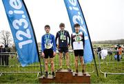 11 March 2023; Minor boys 2500m medallists, Rory Armstrong of Aquinas Grammar School Belfast, gold, Evan Tosh of Belfast Royal Academy, silver, and Oran Duignan of St Flannans Ennis, bronze, during the 123.ie All-Ireland Schools Cross Country Championships at SETU Sports Campus in Carriganore, Waterford. Photo by David Fitzgerald/Sportsfile