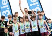 11 March 2023; The St Michaels Enniskillen team celebrate with the cup after winning the minor boys 2500m team competion during the 123.ie All-Ireland Schools Cross Country Championships at SETU Sports Campus in Carriganore, Waterford. Photo by David Fitzgerald/Sportsfile
