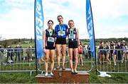 11 March 2023; Senior girls 3500m medallists, Anna Gardiner of Assumption Grammar School, Down, gold, Louise O'Mahony of Coláiste Muire Ennis, Clare, silver, and Avril Millerick of St Marys Midleton, Cork, bronze, during the 123.ie All-Ireland Schools Cross Country Championships at SETU Sports Campus in Carriganore, Waterford. Photo by David Fitzgerald/Sportsfile
