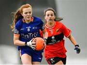 11 March 2023; Ciara McGravey of ATU Donegal in action against Mairéad Bennett of UCC during the 2023 Yoplait Ladies HEC Lynch Cup Final match between ATU Donegal and UCC at University of Galway Connacht GAA Air Dome in Bekan, Mayo. Photo by Piaras Ó Mídheach/Sportsfile