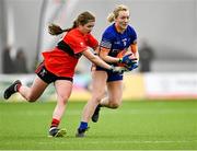 11 March 2023; Ciara O'Donnell of ATU Donegal in action against Caoimhe Mc Grath of UCC during the 2023 Yoplait Ladies HEC Lynch Cup Final match between ATU Donegal and UCC at University of Galway Connacht GAA Air Dome in Bekan, Mayo. Photo by Piaras Ó Mídheach/Sportsfile