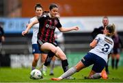 11 March 2023; Kira Bates Crosbie of Bohemians is tackled by Jessie Stapleton of Shelbourne during the SSE Airtricity Women's Premier Division match between Bohemians and Shelbourne at Dalymount Park in Dublin. Photo by Tyler Miller/Sportsfile