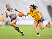 11 March 2023; Laoise Lenehan of DCU Dóchas Éireann in action against Aisling Reidy of University of Limerick during the 2023 Yoplait Ladies HEC O’Connor Cup Final match between DCU Dóchas Éireann and University of Limerick at University of Galway Connacht GAA Air Dome in Bekan, Mayo. Photo by Piaras Ó Mídheach/Sportsfile