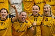 11 March 2023; DCU Dóchas Éireann players, from left, Clodagh Lohan, Chloe Darby, Jade Lyons and Faye O'Connell celebrate after their side's victory in the 2023 Yoplait Ladies HEC O’Connor Cup Final match between DCU Dóchas Éireann and University of Limerick at University of Galway Connacht GAA Air Dome in Bekan, Mayo. Photo by Piaras Ó Mídheach/Sportsfile