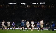 11 March 2023; England players leave the pitch, as the final scoreboard reads England 10 - France 53, after the final whistle of the Guinness Six Nations Rugby Championship match between England and France at Twickenham Stadium in London, England. Photo by Harry Murphy/Sportsfile