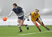 11 March 2023; University of Limerick goalkeeper Mary Bolger in action against Emma Morrissey of DCU Dóchas Éireann during the 2023 Yoplait Ladies HEC O’Connor Cup Final match between DCU Dóchas Éireann and University of Limerick at University of Galway Connacht GAA Air Dome in Bekan, Mayo. Photo by Piaras Ó Mídheach/Sportsfile