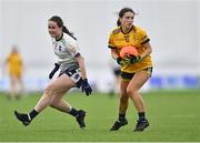 11 March 2023; Clodagh Lohan of DCU Dóchas Éireann in action against Nicola Ward of University of Limerick during the 2023 Yoplait Ladies HEC O’Connor Cup Final match between DCU Dóchas Éireann and University of Limerick at University of Galway Connacht GAA Air Dome in Bekan, Mayo. Photo by Piaras Ó Mídheach/Sportsfile