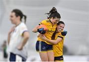 11 March 2023; DCU Dóchas Éireann players Anna Rose Kennedy, left, and Ruth Sargeant celebrate after their side's victory in the 2023 Yoplait Ladies HEC O’Connor Cup Final match between DCU Dóchas Éireann and University of Limerick at University of Galway Connacht GAA Air Dome in Bekan, Mayo. Photo by Piaras Ó Mídheach/Sportsfile