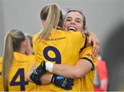 11 March 2023; DCU Dóchas Éireann captain Anna Rose Kennedy celebrates with teammate Chloe Darby, 9, after their side's victory in the 2023 Yoplait Ladies HEC O’Connor Cup Final match between DCU Dóchas Éireann and University of Limerick at University of Galway Connacht GAA Air Dome in Bekan, Mayo. Photo by Piaras Ó Mídheach/Sportsfile
