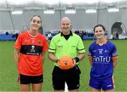 11 March 2023; Referee Shane Curley with team captains Gaby Cashman of UCC and Julie Treaty of ATU Donegal before the 2023 Yoplait Ladies HEC Lynch Cup Final match between ATU Donegal and UCC at University of Galway Connacht GAA Air Dome in Bekan, Mayo. Photo by Piaras Ó Mídheach/Sportsfile