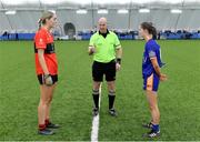 11 March 2023; Referee Shane Curley with team captains Gaby Cashman of UCC and Julie Treaty of ATU Donegal before the 2023 Yoplait Ladies HEC Lynch Cup Final match between ATU Donegal and UCC at University of Galway Connacht GAA Air Dome in Bekan, Mayo. Photo by Piaras Ó Mídheach/Sportsfile