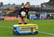 11 March 2023; Sarah Rowe of Bohemians picks up the matchball from the Bohemians Dublin Bus ball carrier before the SSE Airtricity Women's Premier Division match between Bohemians and Shelbourne at Dalymount Park in Dublin. Photo by Tyler Miller/Sportsfile
