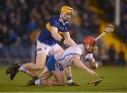 11 March 2023; Tadhg de Búrca of Waterford in action against Jake Morris of Tipperary during the Allianz Hurling League Division 1 Group B match between Tipperary and Waterford at FBD Semple Stadium in Thurles, Tipperary. Photo by Stephen McCarthy/Sportsfile