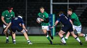 10 March 2023; Sam Prendergast of Ireland in action against Harris McLeod and Craig Davidson of Scotland during the U20 Six Nations Rugby Championship match between Scotland and Ireland at Scotstoun Stadium in Glasgow, Scotland. Photo by Brendan Moran/Sportsfile