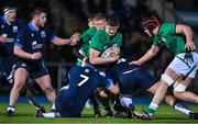 10 March 2023; Evan O’Connell of Ireland is tackled by Rudi Brown and Jake Parkinson of Scotland during the U20 Six Nations Rugby Championship match between Scotland and Ireland at Scotstoun Stadium in Glasgow, Scotland. Photo by Brendan Moran/Sportsfile