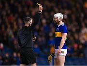 11 March 2023; Michael Breen of Tipperary is shown a yellow card by referee James Owens during the Allianz Hurling League Division 1 Group B match between Tipperary and Waterford at FBD Semple Stadium in Thurles, Tipperary. Photo by Stephen McCarthy/Sportsfile