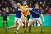 12 March 2023; Nigel Elliott of Antrim in action against James Keyes, left, and Jack Kelly of Laois during the Allianz Hurling League Division 1 Group A match between Antrim and Laois at Corrigan Park in Belfast. Photo by Ramsey Cardy/Sportsfile