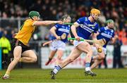 12 March 2023; Padraig Delaney of Laois in action against Niall McKenna of Antrim during the Allianz Hurling League Division 1 Group A match between Antrim and Laois at Corrigan Park in Belfast. Photo by Ramsey Cardy/Sportsfile