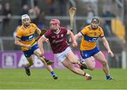 12 March 2023; Ronan Glennon of Galway in action against Tony Kelly, right, and Ryan Taylor of Clare during the Allianz Hurling League Division 1 Group B match between Clare and Galway at Cusack Park in Ennis, Clare. Photo by Ray McManus/Sportsfile