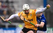 12 March 2023; Paddy Burke of Antrim in action against Martin Phelan of Laois during the Allianz Hurling League Division 1 Group A match between Antrim and Laois at Corrigan Park in Belfast. Photo by Ramsey Cardy/Sportsfile