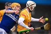12 March 2023; Paddy Burke of Antrim in action against James Keyes of Laois during the Allianz Hurling League Division 1 Group A match between Antrim and Laois at Corrigan Park in Belfast. Photo by Ramsey Cardy/Sportsfile
