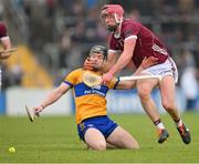12 March 2023; Tony Kelly of Clare is tackled by Ronan Glennon of Galway during the Allianz Hurling League Division 1 Group B match between Clare and Galway at Cusack Park in Ennis, Clare. Photo by Ray McManus/Sportsfile