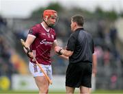 12 March 2023; Referee Colm Lyons speaks to Conor Whelan of Galway before issuing him a yellow card during the Allianz Hurling League Division 1 Group B match between Clare and Galway at Cusack Park in Ennis, Clare. Photo by Ray McManus/Sportsfile