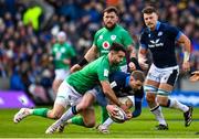 12 March 2023; Finn Russell of Scotland is tackled by Conor Murray of Ireland during the Guinness Six Nations Rugby Championship match between Scotland and Ireland at BT Murrayfield Stadium in Edinburgh, Scotland. Photo by Harry Murphy/Sportsfile