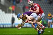 12 March 2023; Charlie McGuckin of Wexford is tackled by Shane Barrett of Cork during the Allianz Hurling League Division 1 Group A match between Cork and Wexford at Páirc Ui Chaoimh in Cork. Photo by Eóin Noonan/Sportsfile