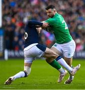 12 March 2023; Robbie Henshaw of Ireland is tackled by Finn Russell of Scotland during the Guinness Six Nations Rugby Championship match between Scotland and Ireland at BT Murrayfield Stadium in Edinburgh, Scotland. Photo by Harry Murphy/Sportsfile