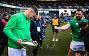 12 March 2023; Jonathan Sexton of Ireland has water thrown on him by teammates Cian Healy, right, as he holds the Centenary Quaich after the Guinness Six Nations Rugby Championship match between Scotland and Ireland at BT Murrayfield Stadium in Edinburgh, Scotland. Photo by Harry Murphy/Sportsfile