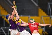 12 March 2023; Seamus Harnedy of Cork in action against Kevin Foley, left, and Simon Donohoe of Wexford during the Allianz Hurling League Division 1 Group A match between Cork and Wexford at Páirc Ui Chaoimh in Cork. Photo by Eóin Noonan/Sportsfile