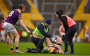 12 March 2023; Matthew O'Hanlon of Wexford receives medical attention for an injury during the Allianz Hurling League Division 1 Group A match between Cork and Wexford at Páirc Ui Chaoimh in Cork. Photo by Eóin Noonan/Sportsfile