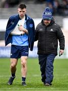 12 March 2023; Seán Currie of Dublin leaves the pitch at half-time, alongside Dublin GAA chairman Mick Seavers, during the Allianz Hurling League Division 1 Group A match between Kilkenny and Dublin at UPMC Nowlan Park in Kilkenny. Photo by Piaras Ó Mídheach/Sportsfile