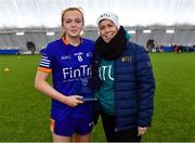 11 March 2023; President of ATU Dr Orla Flynn with player of the match Ciara McGravey of ATU after the 2023 Yoplait Ladies HEC Lynch Cup Final match between ATU Donegal and UCC at University of Galway Connacht GAA Air Dome in Bekan, Mayo. Photo by Piaras Ó Mídheach/Sportsfile